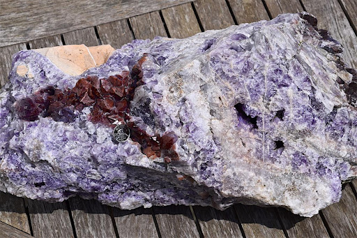 Close up view of a purple amethyst raw gem