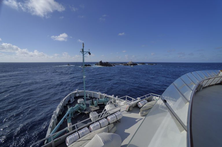 The deck of a boat looking out to sea